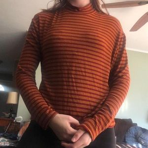Red and yellow striped mock neck shirt